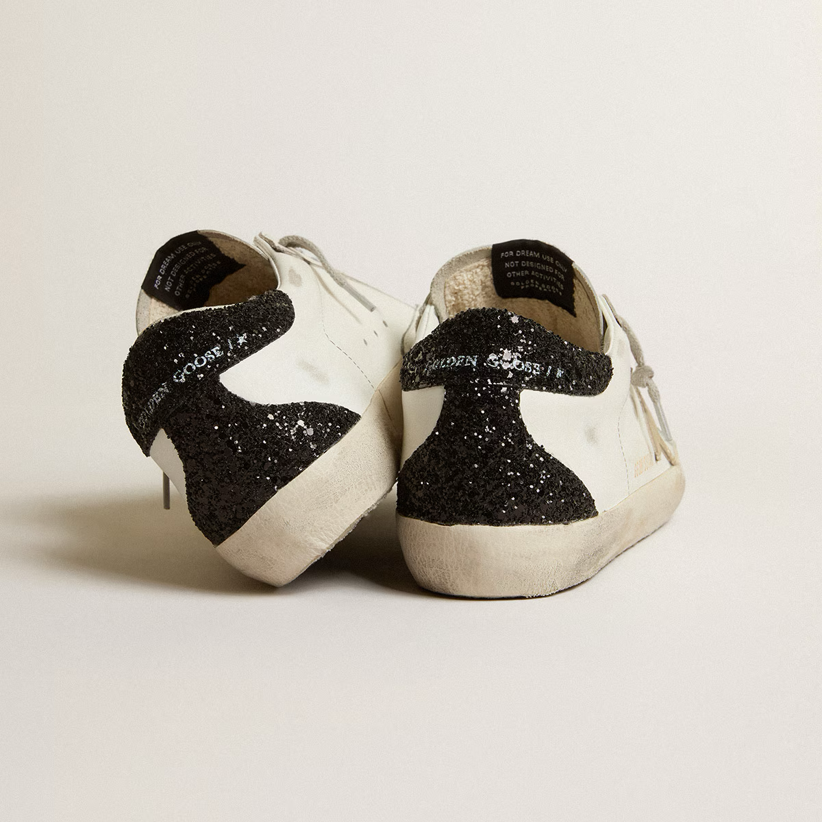 gold star and black glitter heel tab