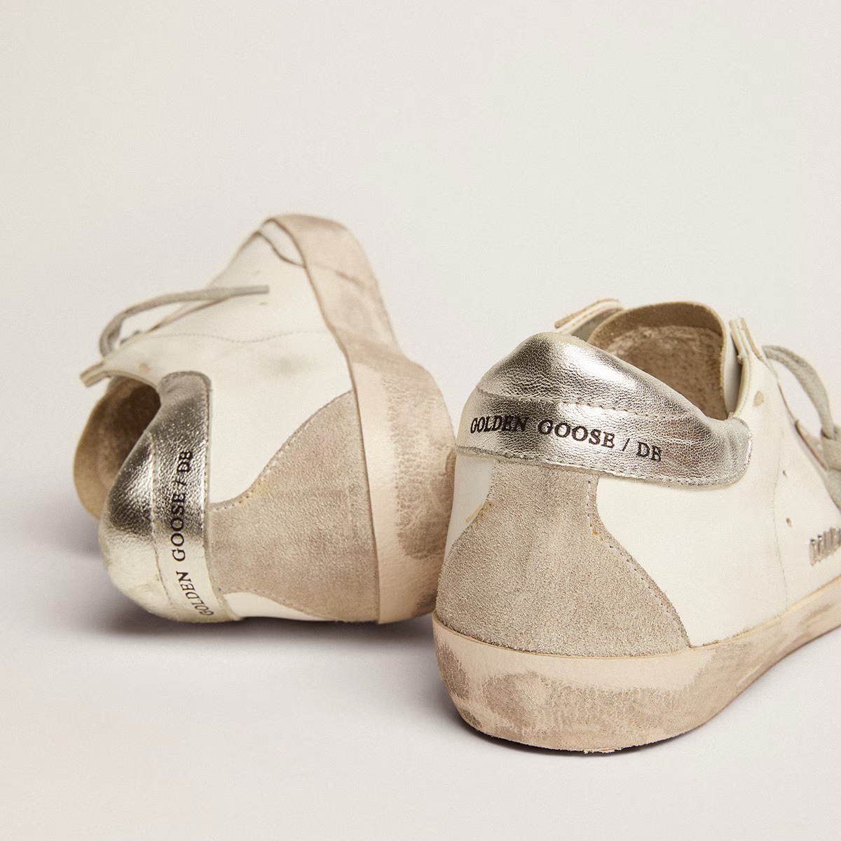 silver heel tab and metal stud lettering